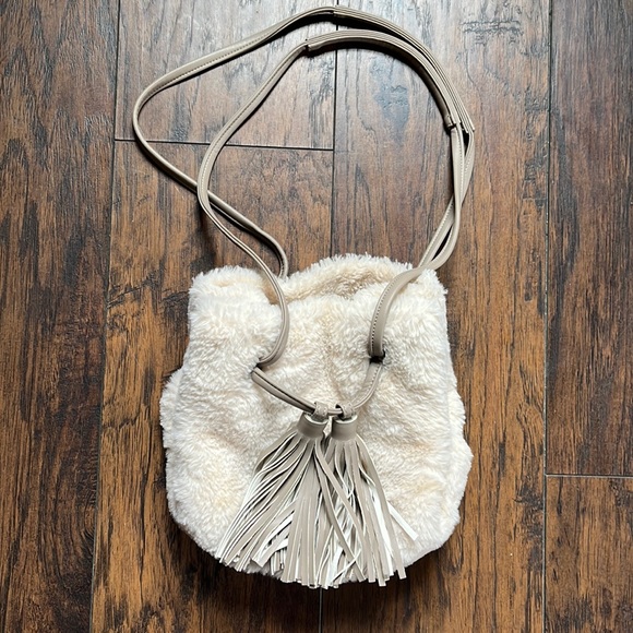 Urban Renewal Cream Faux Fur Tassel Purse - Picture 1 of 10